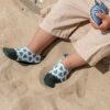 Chaussons tout terrain sur le sable, motif Palme